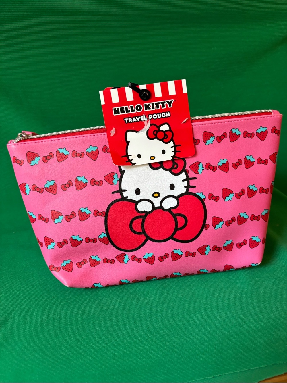 New Hello Kitty Travel pouch strawberry and bows
New w tag 12”